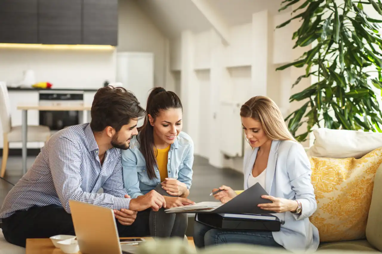 Young couple consulting personal insurance